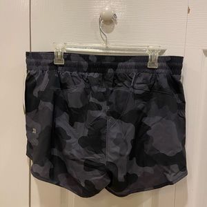 All In Motion running shorts. Black camo size large. NWT